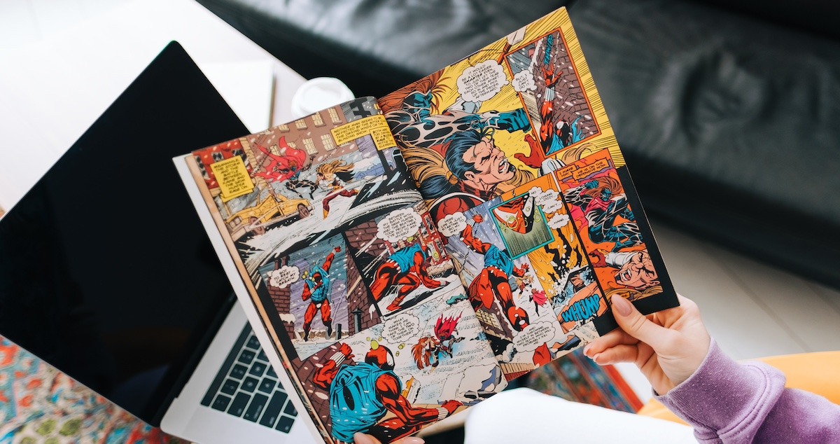 a writer looking at a comic book script
